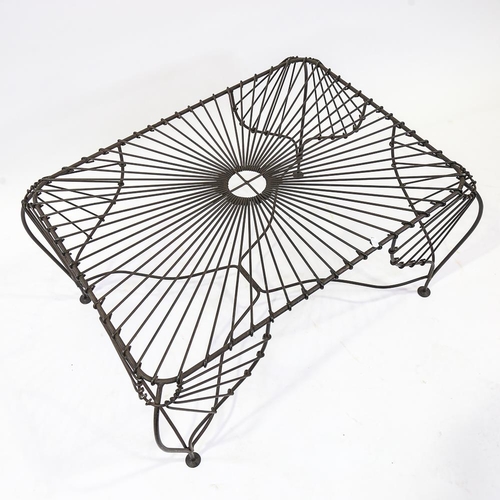 2097 - A 1980s wrought-wire frame table of organic form, height 47cm, length 78cm