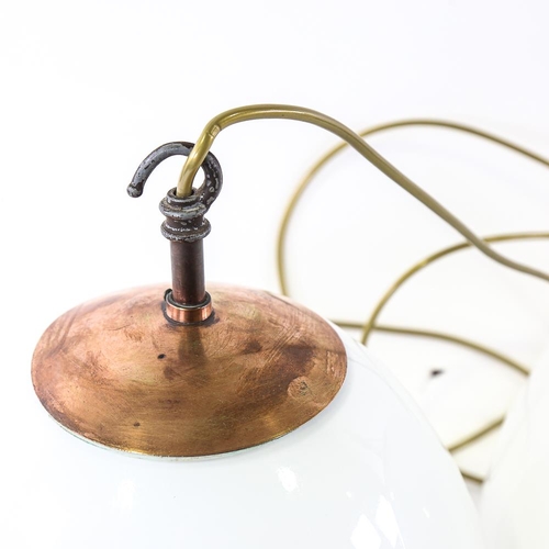 2109 - A pair of vintage globular ceiling lights with copper hanging fixtures, pendant height to hook 36cm