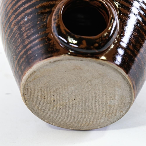 2121 - JONATHAN CHISWELL-JONES - Studio pottery flagon with Temoku glaze, height 27cm