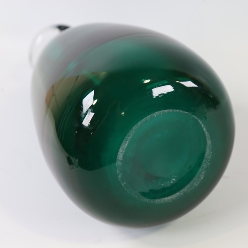 2062 - A large green glass hand-blown bottle vase, height 36cm