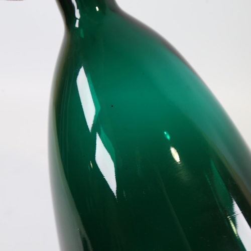 2062 - A large green glass hand-blown bottle vase, height 36cm