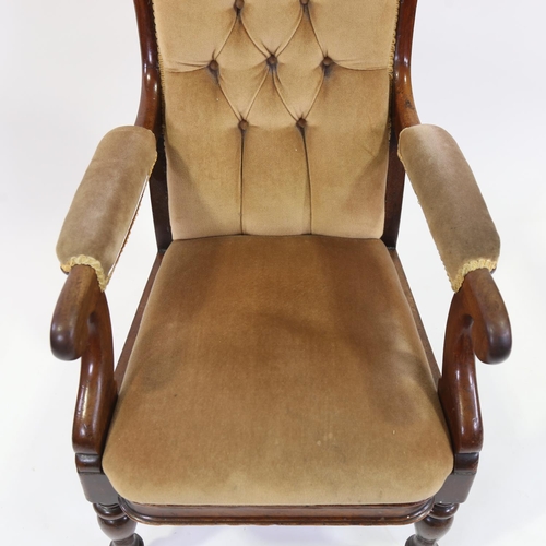 268 - A Victorian mahogany framed open arm fireside chair