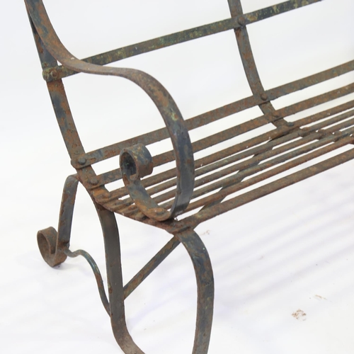 269 - A Victorian wrought-iron 3-seat garden bench with triple-curved back, length 150cm