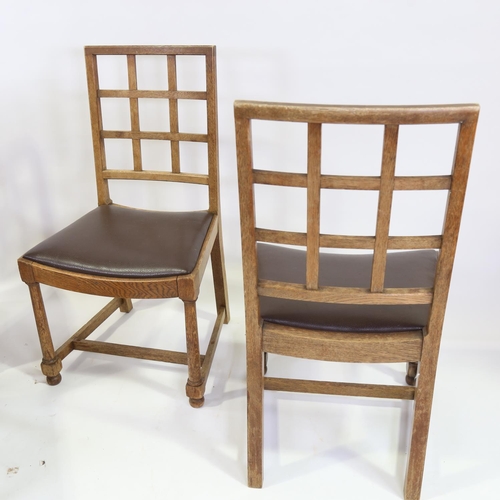 319 - A set of 4 1920s Heals Tilden oak lattice-back dining chairs with leather seats