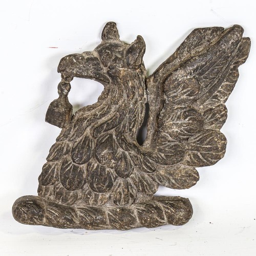 309 - A 19th century solid cast lead phoenix design fire mark, height 20cm