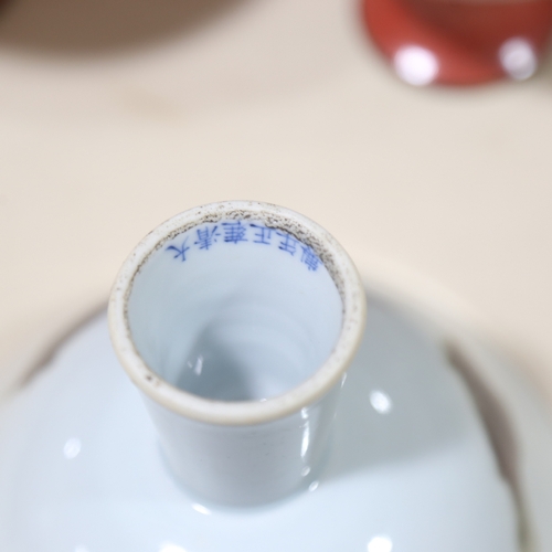 172 - A Chinese white glaze porcelain stemmed bowl, with painted fish design, 6 character mark, diameter 1... 