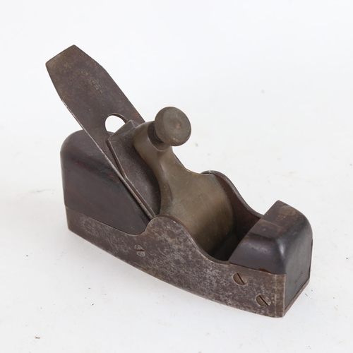 109 - An Antique rosewood and steel woodworking plane, with blade stamped Ward