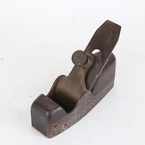 109 - An Antique rosewood and steel woodworking plane, with blade stamped Ward