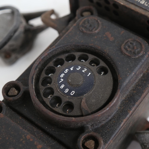 115 - A German Second World War Period Siemens bunker telephone, with original brass plaque, height 49cm