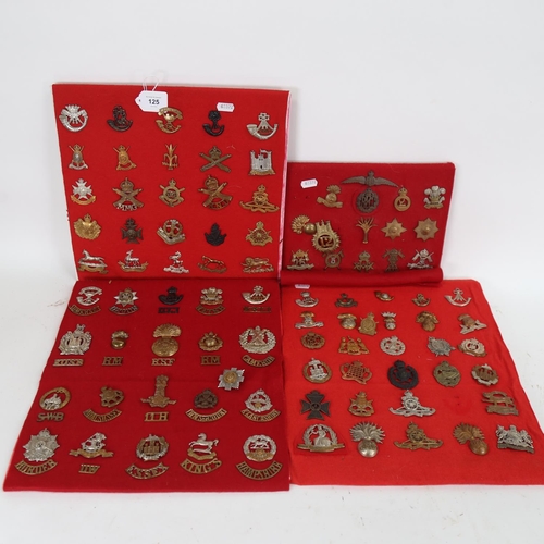 125 - A quantity of various military cap badges, including Royal Flying Corps, Motor Machine Gun Corps, Ta... 