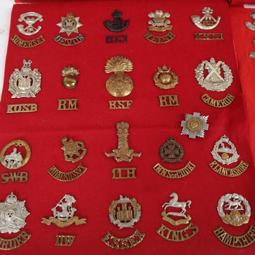 125 - A quantity of various military cap badges, including Royal Flying Corps, Motor Machine Gun Corps, Ta... 