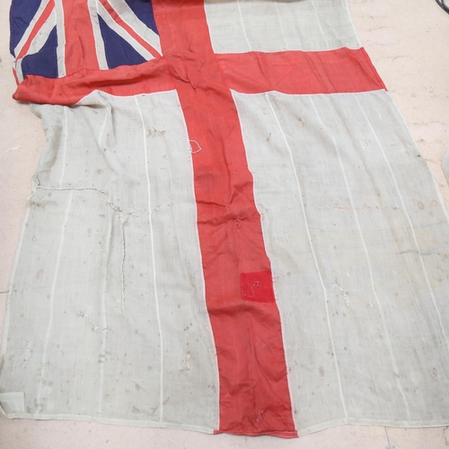 127 - A large British Royal Navy White Ensign flag, 125cm x 235cm