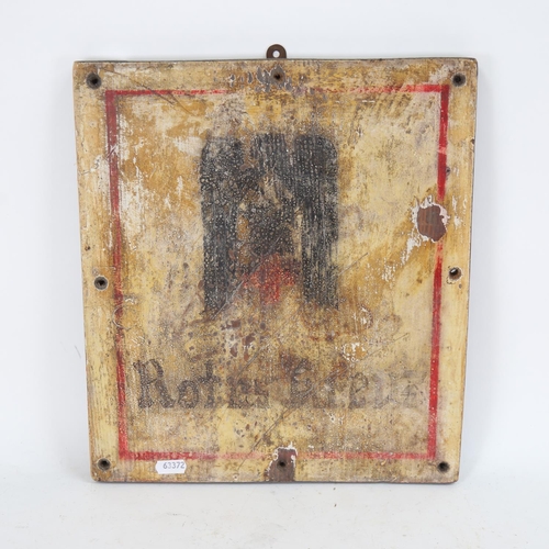 128 - A German Second World War Period Red Cross (Rotes Kreuz) painted pine wall hanging plaque, 35cm x 32... 