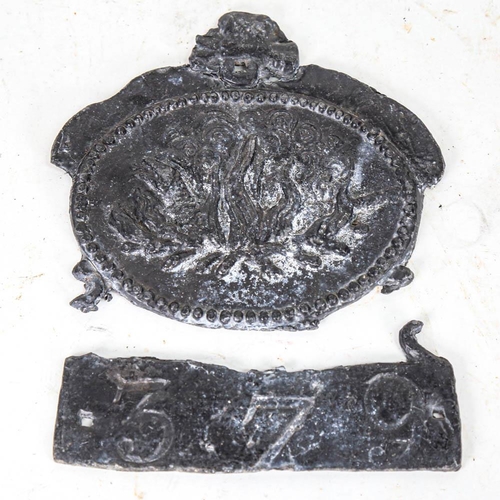 139 - Antique lead Fire Insurance plaque, depicting a dragon amongst flames, length 18cm, and a small plaq... 