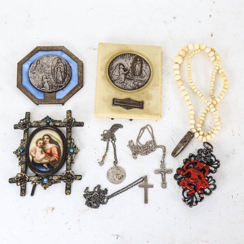 149 - A group of religious items, including a miniature painted Madonna and Child