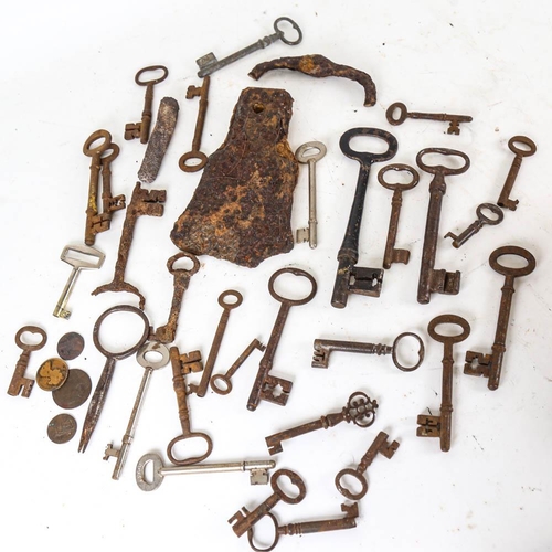 150 - Antique door keys, and an axe head