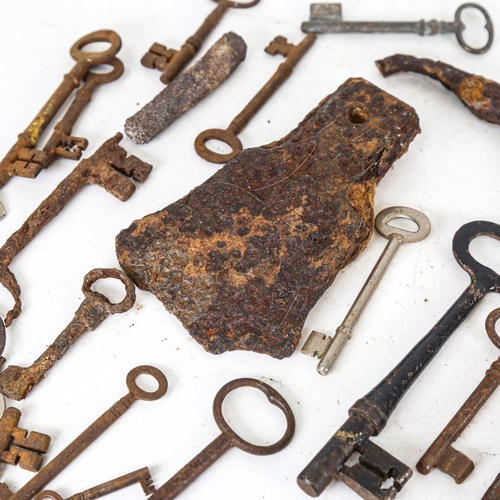 150 - Antique door keys, and an axe head