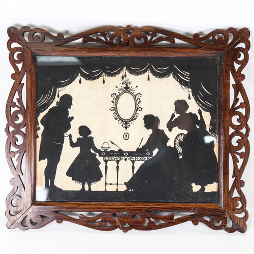 152 - A 19th century family silhouette, in pierced rosewood frame, overall 21cm x 25cm