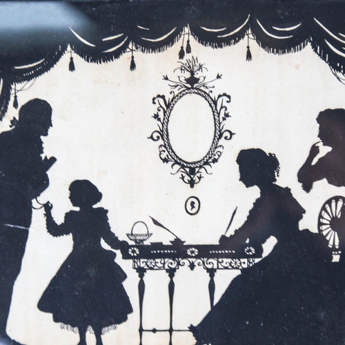 152 - A 19th century family silhouette, in pierced rosewood frame, overall 21cm x 25cm