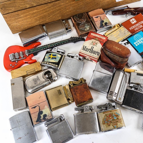 156 - A collection of lighters, including rare American lighters