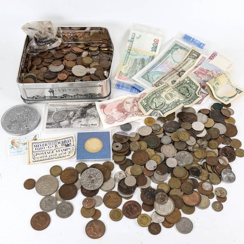 169 - A collection of British and foreign coins and banknotes