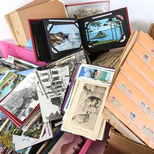 183 - 2 boxes of postage stamp albums, postcard albums etc