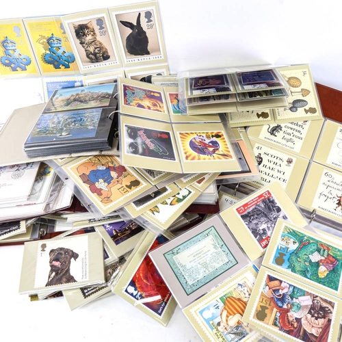 188 - A box of stamp albums, Royal Mail postcards etc