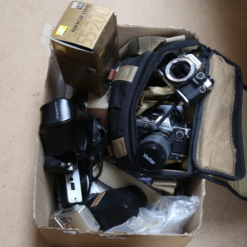 83 - Various Vintage cameras and equipment, including 2 x Olympus OM10 35mm single lens reflex cameras, l... 