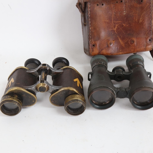 91 - A pair of First World War Period military issue Dollond Prismatic x 6 binoculars, and a pair of Germ... 