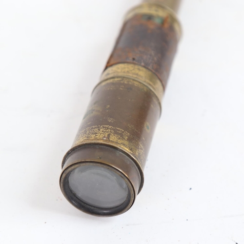 95 - An Antique brass 4-draw telescope, with rain guard, extended length 42cm