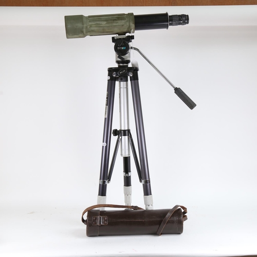 99 - An Optolyth 22-60x70 military style spotter telescope, in leather case, with Slik video tripod