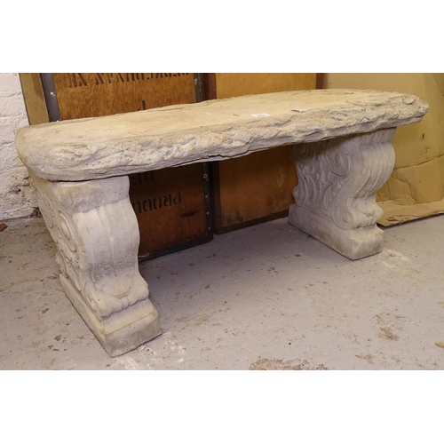 2401 - A concrete 3-section garden bench, on scrolled supports, L100cm, H44cm