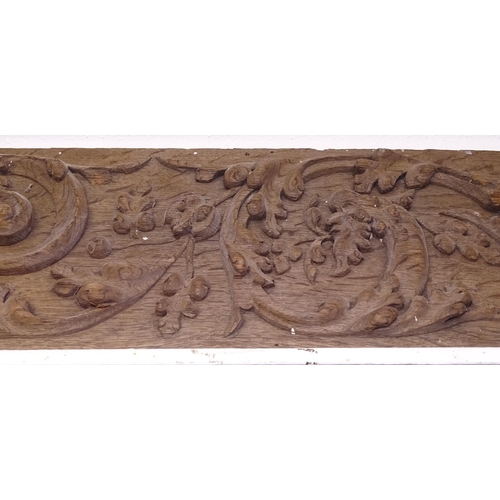 2403 - A long 19th century oak panel, with applied carved acanthus leaf decoration, L320cm, H20cm