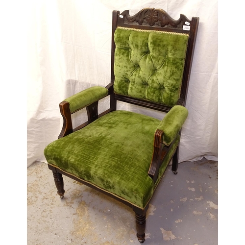 2420 - A Victorian carved framed and button-back upholstered open armchair