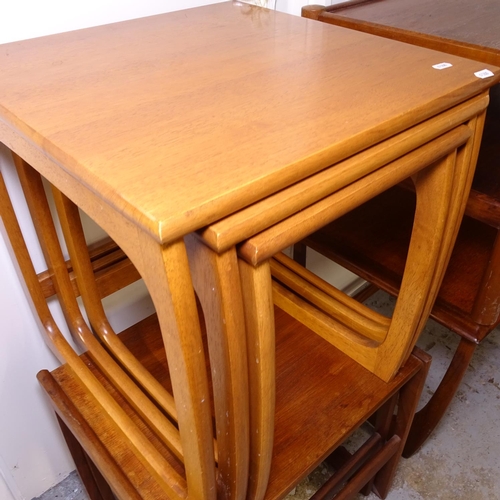 2421 - 2 mid-century teak rectangular coffee tables, and a teak nest of 3 tables and another (4)