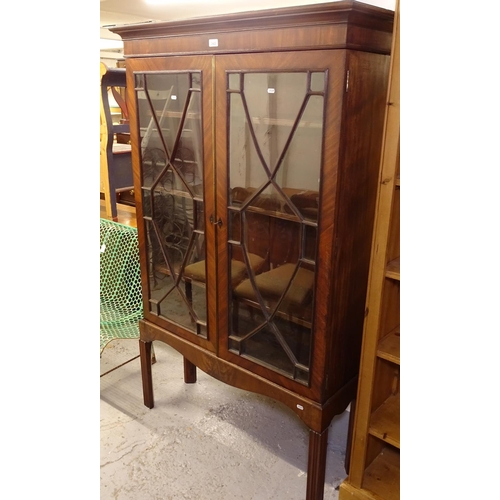 2423 - A 19th century mahogany bookcase on stand, with 2 lattice glazed doors and adjustable shelves, W104c... 