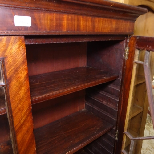 2423 - A 19th century mahogany bookcase on stand, with 2 lattice glazed doors and adjustable shelves, W104c... 