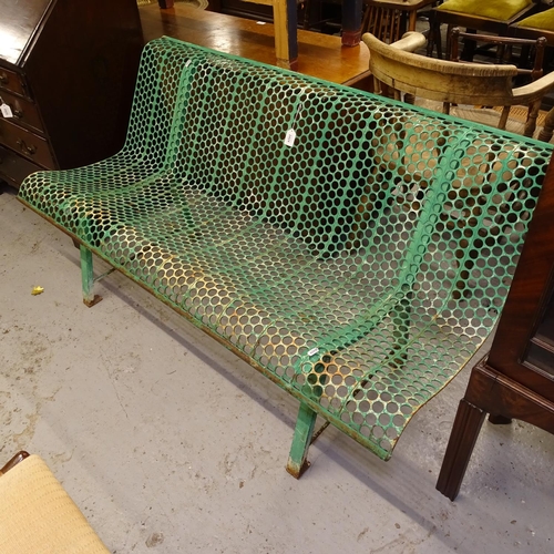 2424 - A painted and pierced metal garden bench, W146cm