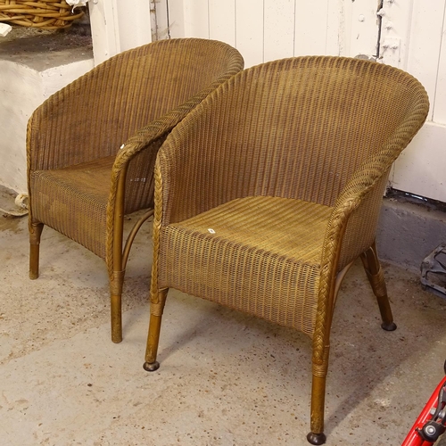 2429 - A pair of early 20th century gold Lloyd Loom bedroom chairs