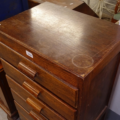 2434 - A narrow Edwardian oak 8-drawer chest, W51cm, H107cm, D37cm