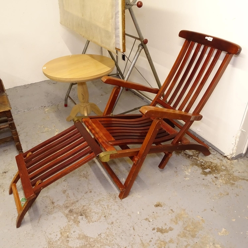 2439 - A stained hardwood folding steamer chair