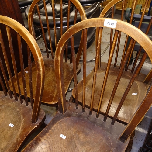 2449 - A set of 5 1920s elm-seated stick-back kitchen chairs