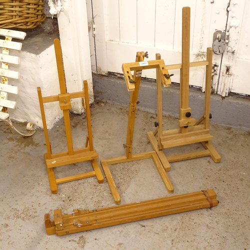 2453 - A Daler-Rowley table-top easel, an Italian beech table-top easel, and 2 others (4)