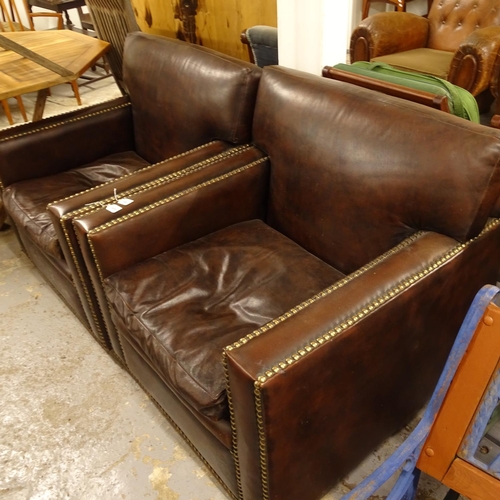 2459 - A pair of brown leather-upholstered and brass-studded armchairs, W86cm, H90cm, seat height 43cm and ... 