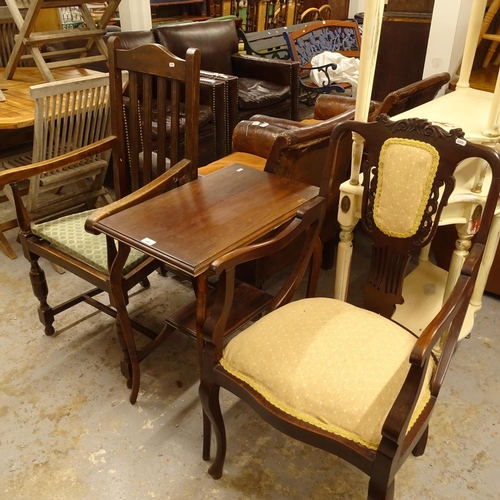 2463 - A 1920s oak elbow chair, an Edwardian mahogany open-arm chair, and an occasional table (3)