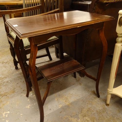 2463 - A 1920s oak elbow chair, an Edwardian mahogany open-arm chair, and an occasional table (3)