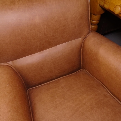 2475 - An early 20th century brown leather-upholstered Club chair