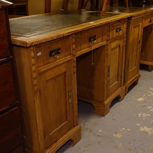 2487 - An Edwardian pine writing desk, with green leather skiver, and fitted drawers and cupboards under, W... 