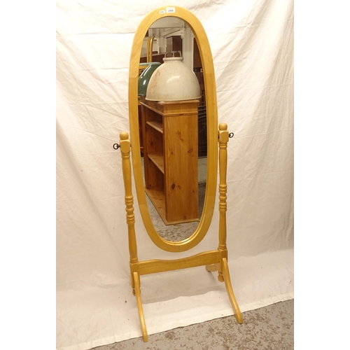 2496 - A modern beech-framed oval cheval mirror