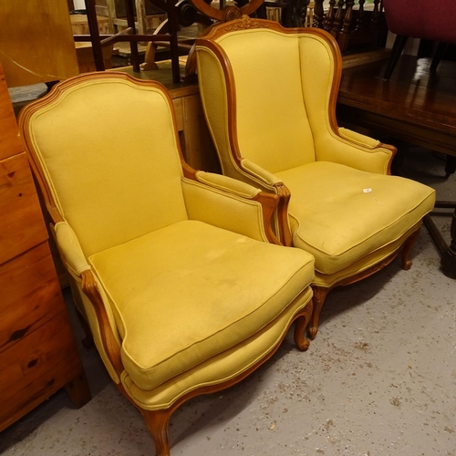 2501 - His and Hers carved beech-framed and upholstered armchairs, with loose cushions